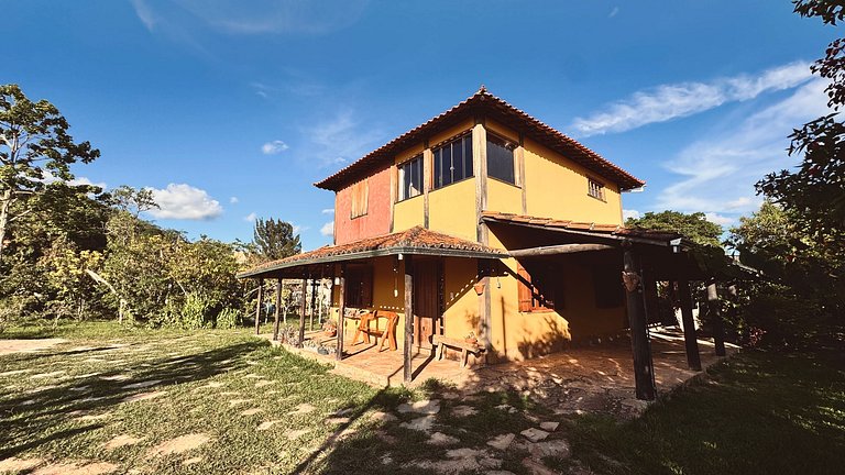 Quarto aconchegante em casa rústica com jardim