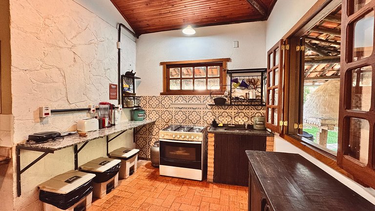 Quarto aconchegante em casa rústica com jardim