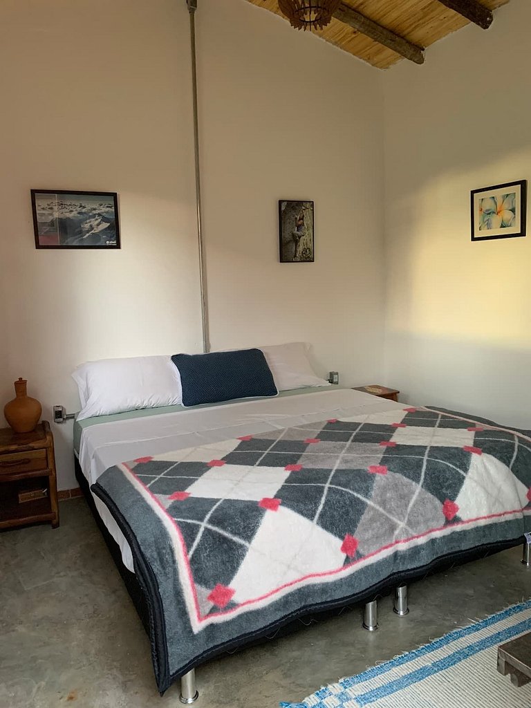 Casa charmosa com chalés, jardim e área gramada