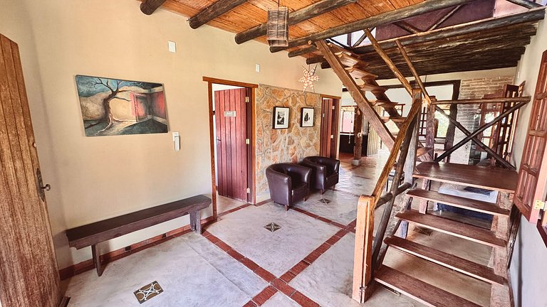 Quarto aconchegante em casa rústica com jardim