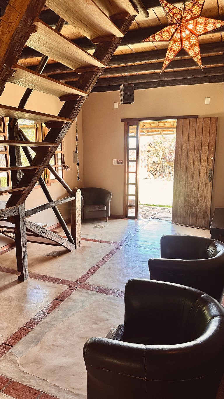 Quarto aconchegante em casa rústica com jardim